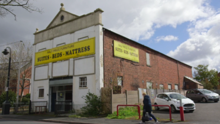 The former Bloxwich Wesleyan Methodist Church 2016, now shows large sign as furniture store
