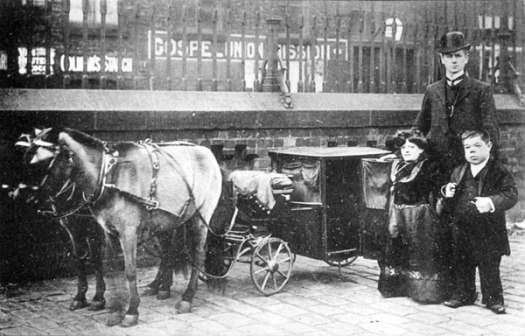 B+W image of male and female Dwarves at Bloxwich Wakes c1908 with small horse and carriage and full sized man